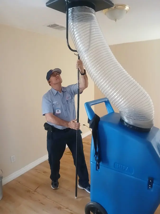 HVAC Installation technician using HEPA equipment in Orangetree
